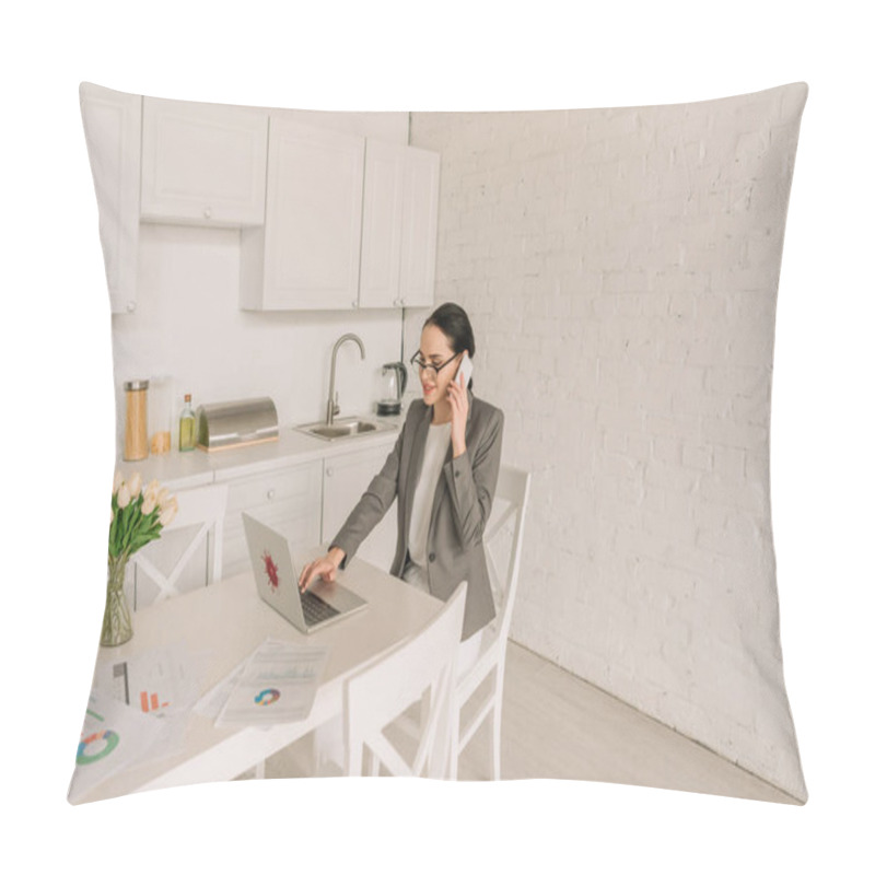 Personality  Smiling Businesswoman In Blazer Over Pajamas Talking On Smartphone And Using Laptop In Kitchen Near Documents And Fresh Tulips Pillow Covers