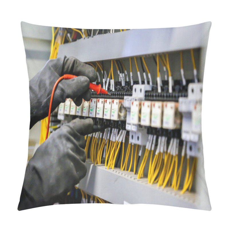 Personality  Electrical Engineer Using Digital Multi-meter Measuring Equipment To Checking Electric Current Voltage At Circuit Breaker In Main Power Distribution Board. Pillow Covers