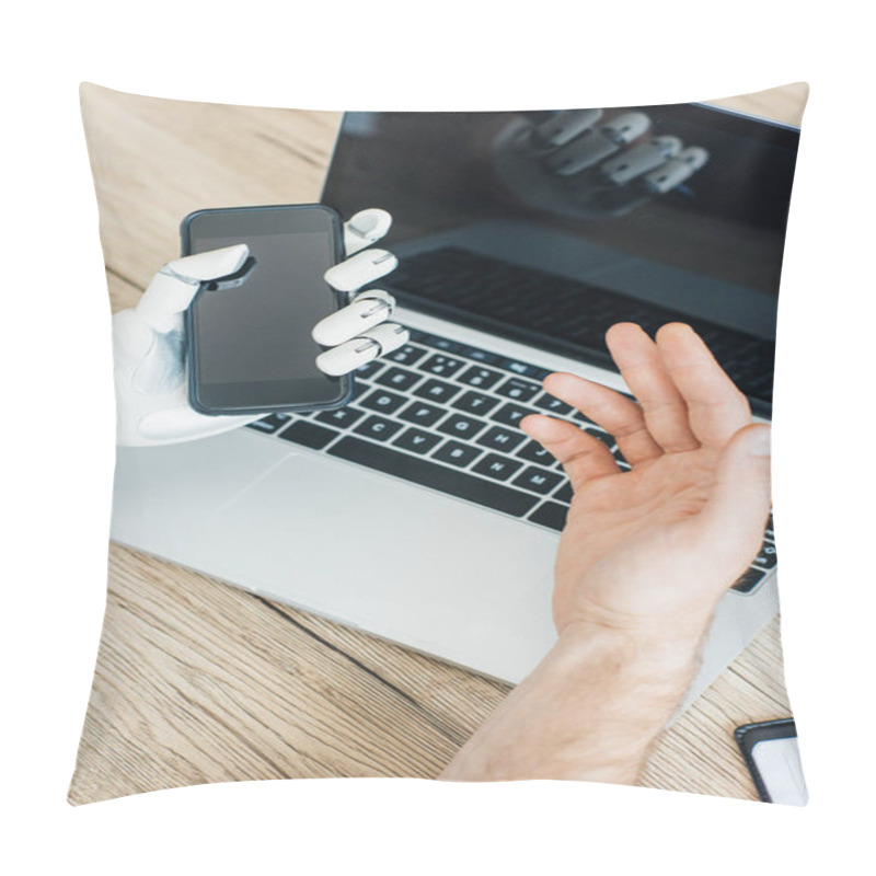 Personality  Close-up View Of Human And Robot Hands Using Smartphone And Laptop At Wooden Table  Pillow Covers