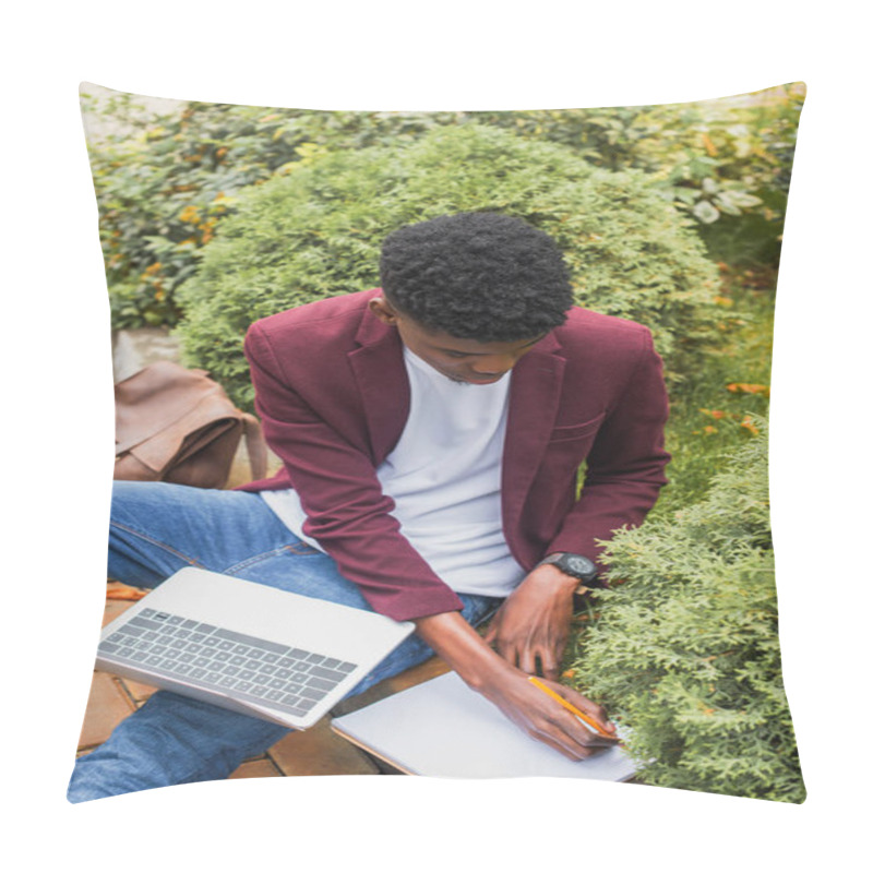 Personality  High Angle View Of Young Freelancer Using Laptop And Writing In Notebook While Sitting On Curb On Street Pillow Covers