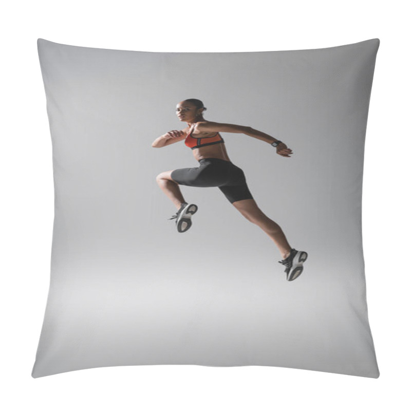 Personality  Full Length Of Brunette African American Woman Levitating During Work Out On Grey Pillow Covers