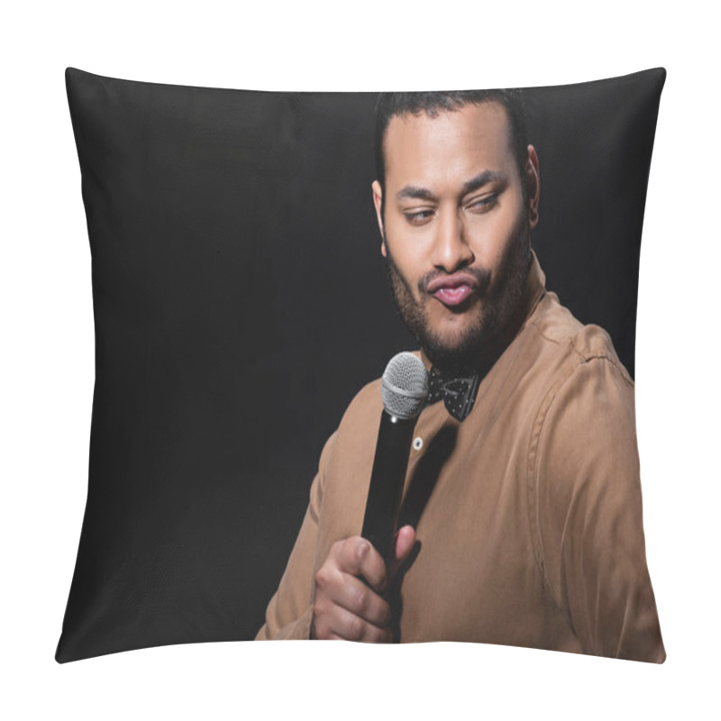 Personality  Skeptical Indian Stand Up Comedian Telling Joke Into Microphone And Pouting Lips Isolated On Black  Pillow Covers