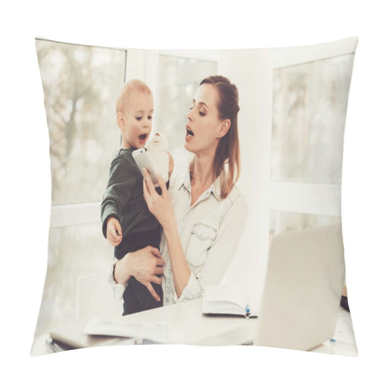 Personality  Woman Is Playing With A Baby In The Workplace. Problems Solving. Official Clothes. Comfortable Environment. Calmness And Confidence. Concentrated Worker. Parent Duty. Family Relationship. Pillow Covers