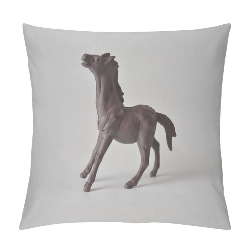 Personality  Sculpture Of A Horse In Motion Against A Neutral Background. Pillow Covers