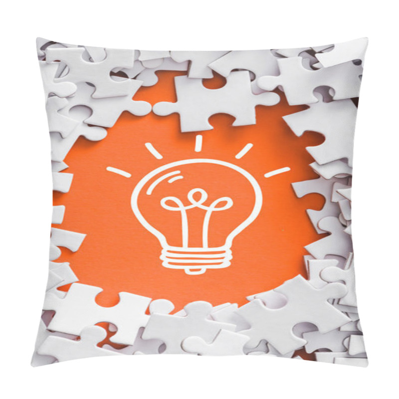 Personality  Top View Of Frame Of White Jigsaw Puzzle Pieces Around Of Light Bulb Lettering On Orange Pillow Covers