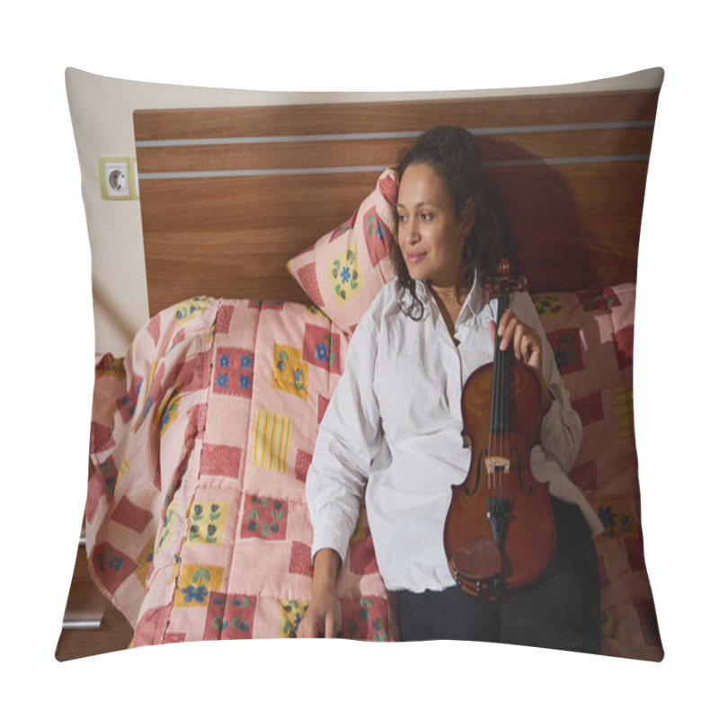 Personality  A Woman Sits On A Patterned Bed Holding A Violin, Exuding Tranquility And Contemplation. The Warm Tones Create A Cozy And Reflective Atmosphere, Highlighting The Intimate Connection With Music. Pillow Covers