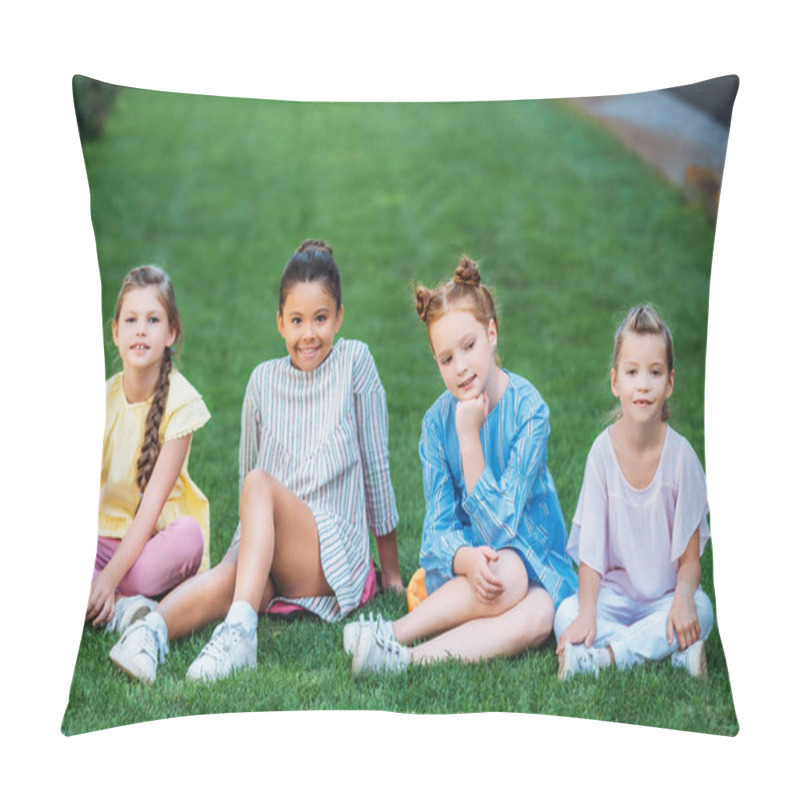 Personality  Group Of Adorable Schoolgirls Sitting On Green Grass Together And Looking At Camera Pillow Covers