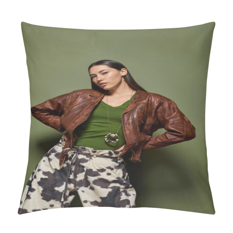 Personality  Young Woman In A Trendy Brown Leather Jacket And Patterned Pants Strikes A Pose With Confidence. Pillow Covers