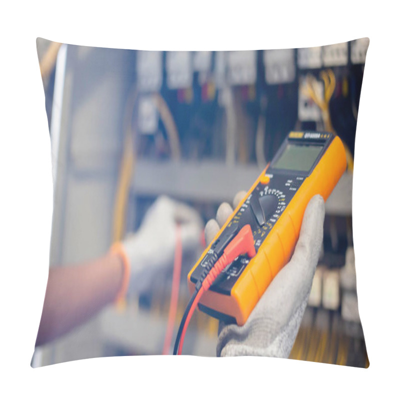 Personality  Electrician Engineer Uses A Multimeter To Test The Electrical Installation And Power Line Current In An Electrical System Control Cabinet. Pillow Covers