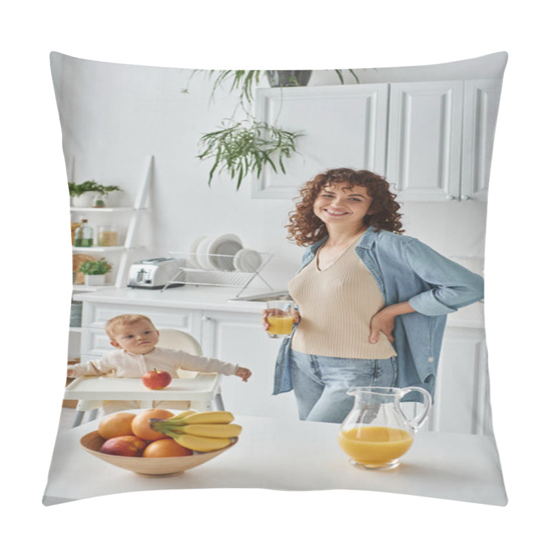 Personality  Cheerful Woman With Orange Juice Standing With Hand On Hip Near Kid In Baby Chair And Ripe Fruits Pillow Covers