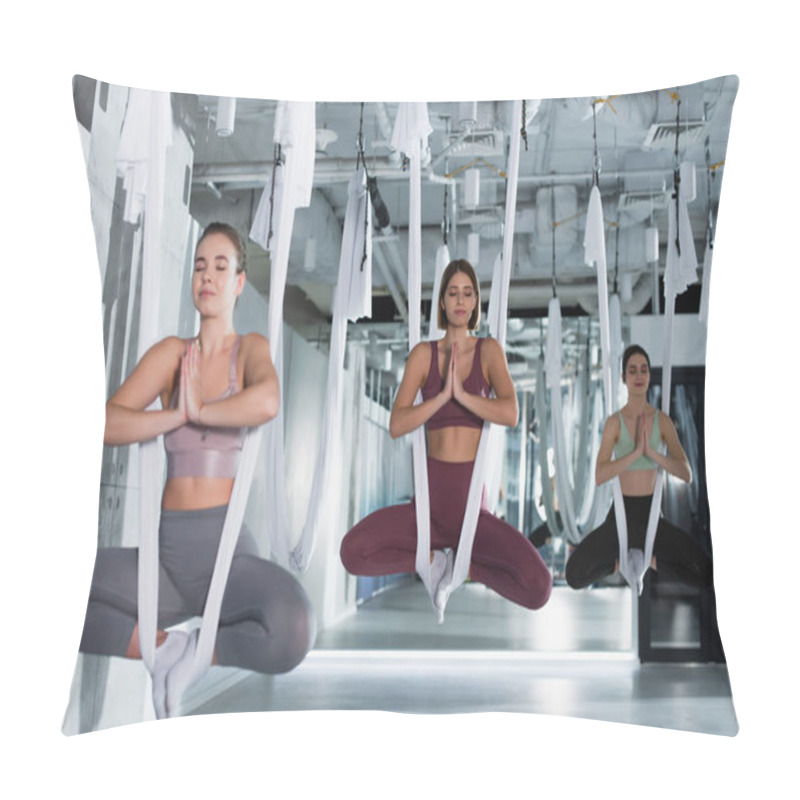 Personality  Group Of Sportive Women Meditating In Lotus Pose While Practicing Aerial Yoga Pillow Covers