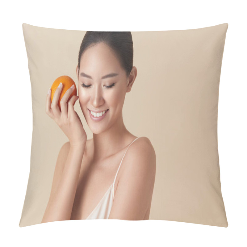 Personality  Beauty Face. Fruit And Model Portrait. Smiling Asian Woman Holds Juicy Orange In Hand And Looking Down. Natural Vitamins For Healthy Skin. Beautiful Ethnic Girl With Citrus On Beige Background.  Pillow Covers