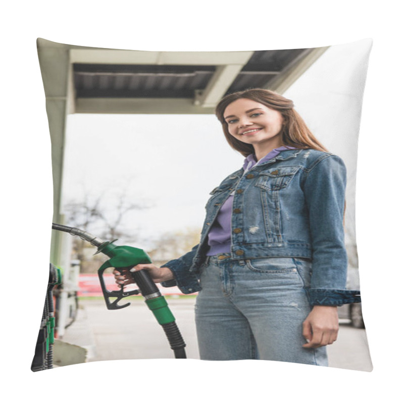 Personality  Happy Woman Looking At Camera While Holding Gasoline Pistol Near Car Pillow Covers