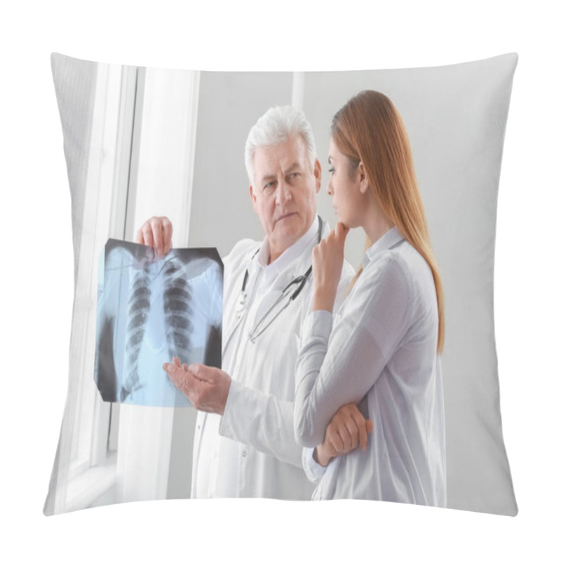 Personality  Senior Doctor With X-ray Image Of Lungs And Female Patient In Clinic Pillow Covers