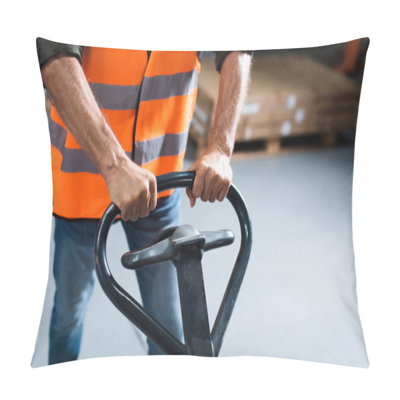 Personality  Cropped Shot Of Warehouse Worker In Jeans And Safety Vest Transporting Pallet With Hand Truck Pillow Covers