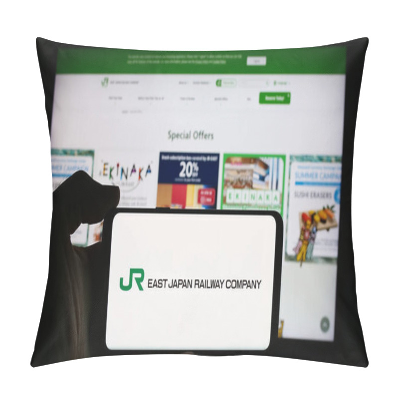 Personality  Stuttgart, Germany - 07-23-2024: Person Holding Cellphone With Logo Of Japanese Railroad Business East Japan Railway Company In Front Of Business Webpage. Focus On Phone Display. Pillow Covers