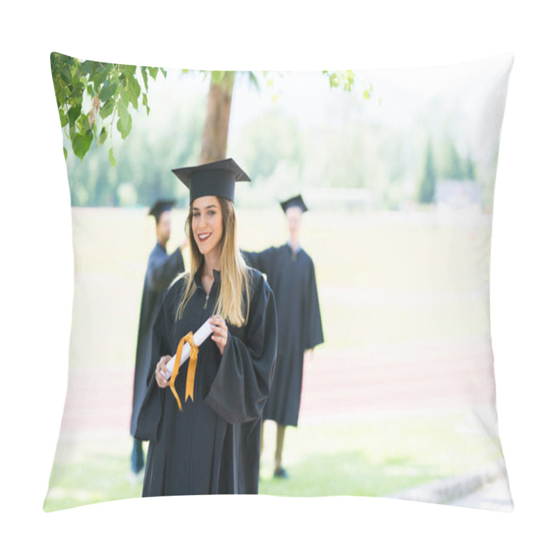 Personality  Graduation: Student Standing With Diploma With Friends Behind Pillow Covers