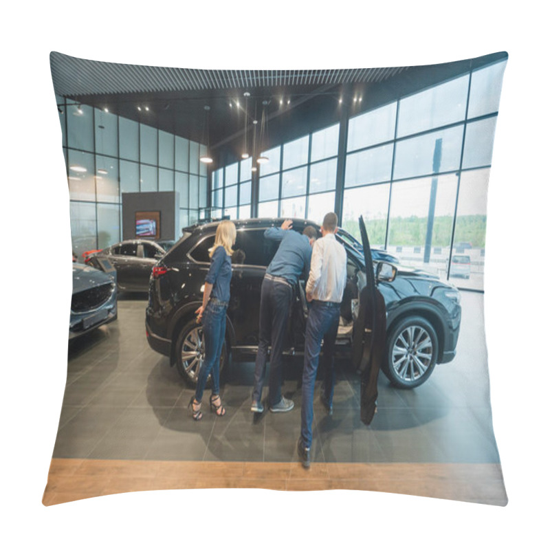 Personality  The Seller Demonstrates The Interior Of The Car To Buyers. Caucasian Couple Chooses A Car Pillow Covers