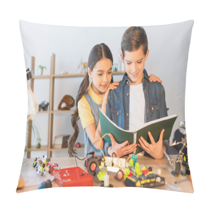 Personality  Preteen Girl Hugging Friend With Notebook Near Blurred Robotics Model At Home  Pillow Covers