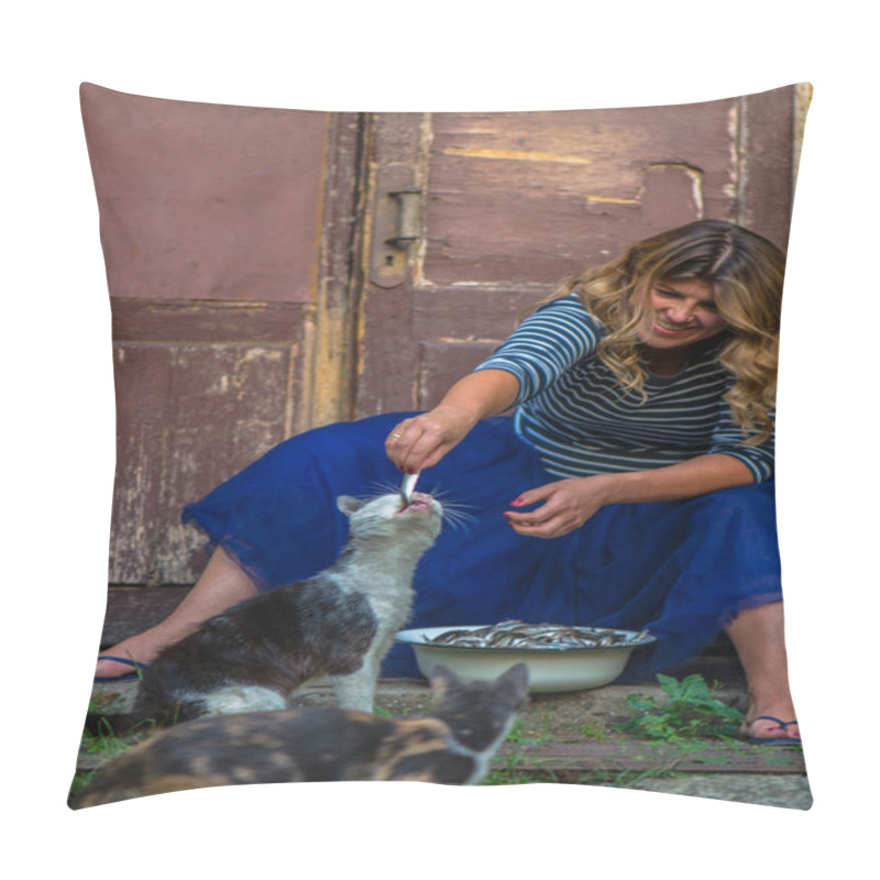 Personality  Woman Feeding Cat With Anchovy In Bowl Outdoors In Countryside Pillow Covers