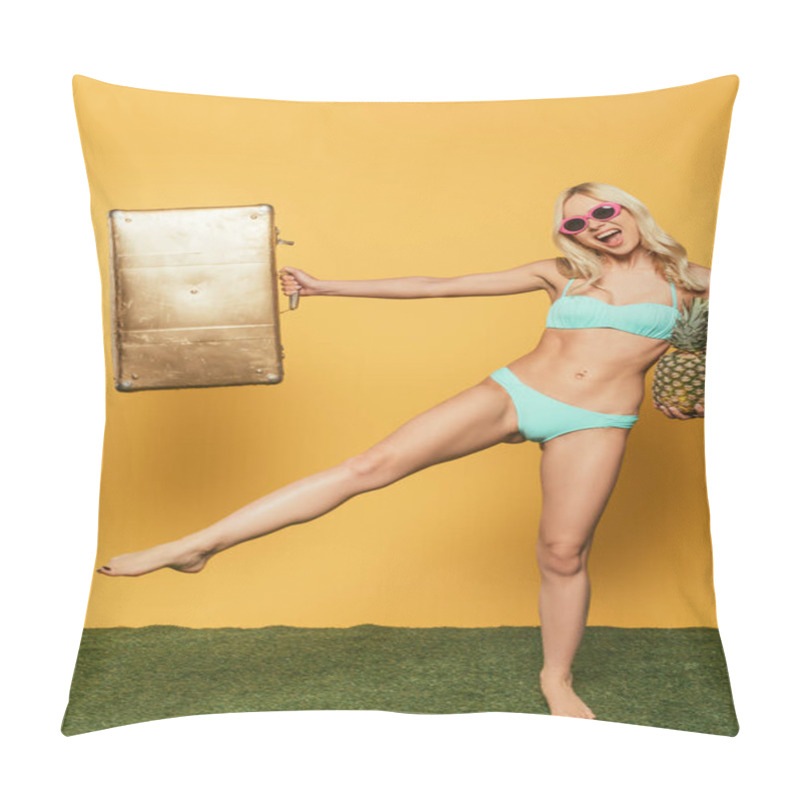 Personality  Joyful, Attractive Blonde Girl In Swimsuit Standing On One Leg While Holding Vintage Suitcase And Whole Pineapple On Yellow Background Pillow Covers