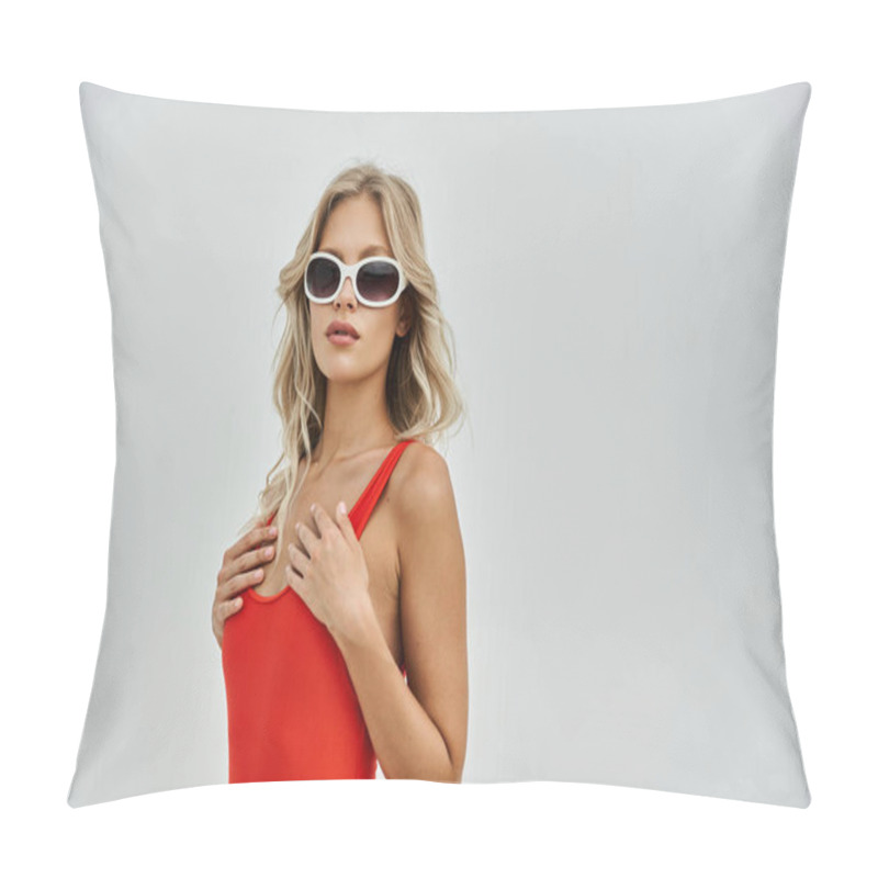 Personality  A Blonde Woman Wearing A Bright Orange Swimsuit And White Sunglasses Poses Against A Grey Background. Pillow Covers