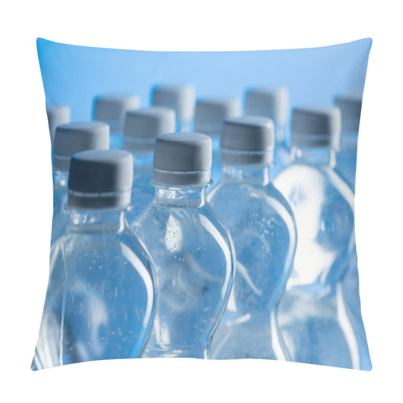 Personality  Selective Focus Of Plastic Water Bottles Isolated On Blue Pillow Covers