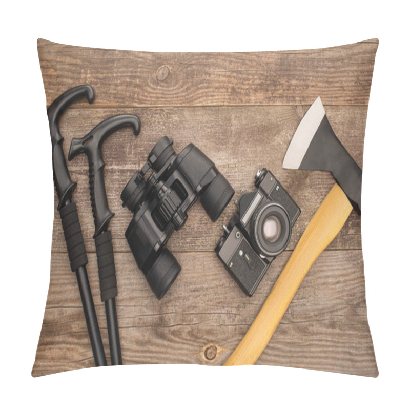 Personality  Top View Of Trekking Poles, Binoculars, Photo Camera And Axe On Wooden Surface Pillow Covers