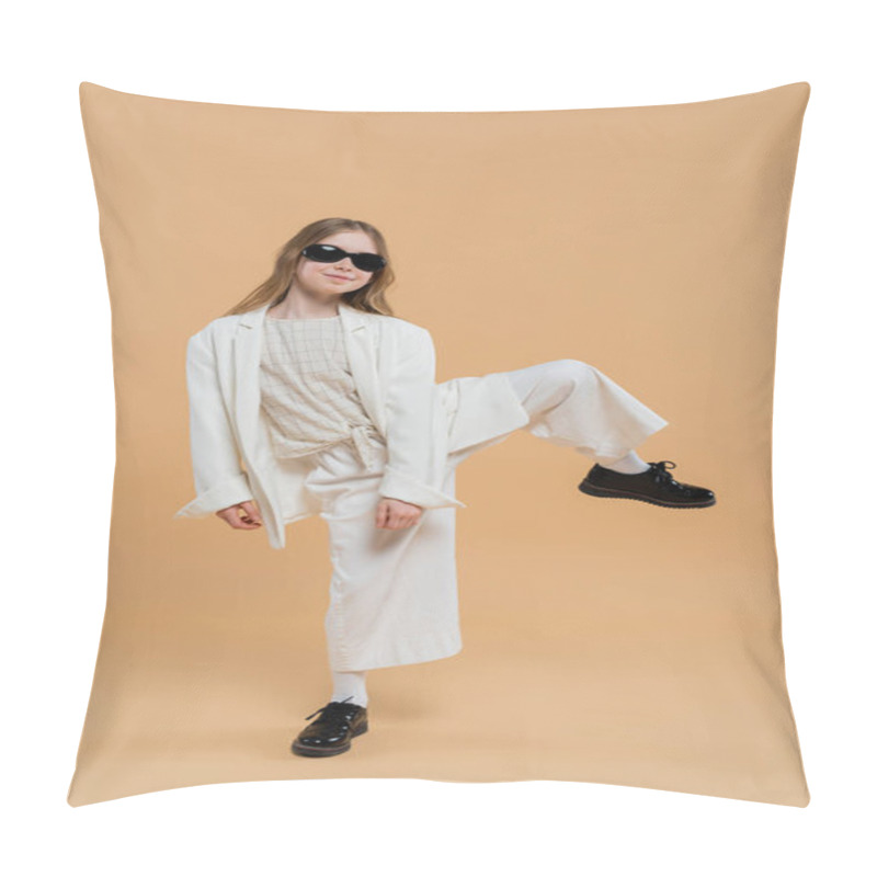 Personality  Trendy Preteen Girl In White Suit, Sunglasses And Black Shoes Posing With Raised Leg And Standing On Beige Background, Fashionable Outfit, Formal Attire, Child Model, Trendsetter, Style  Pillow Covers