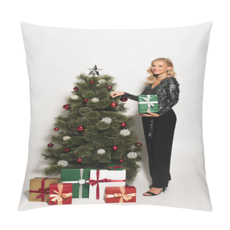 Personality  Full Length View Of Elegant Woman With Gift Box Smiling At Camera Near Christmas Tree On White Pillow Covers