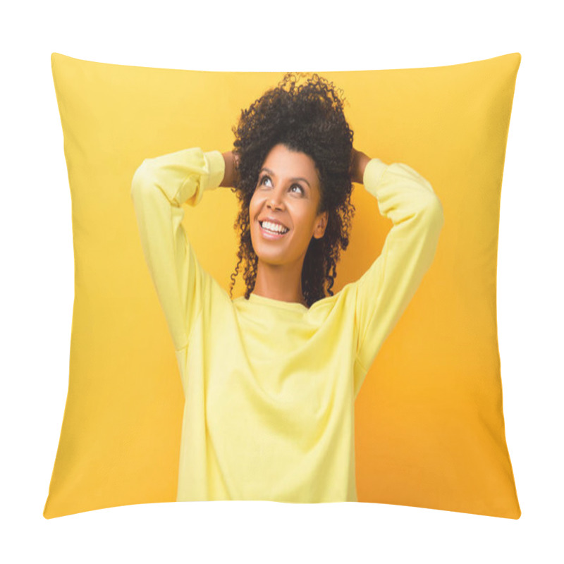 Personality  Happy African American Woman Looking Away While Fixing Curly Hair On Yellow Pillow Covers