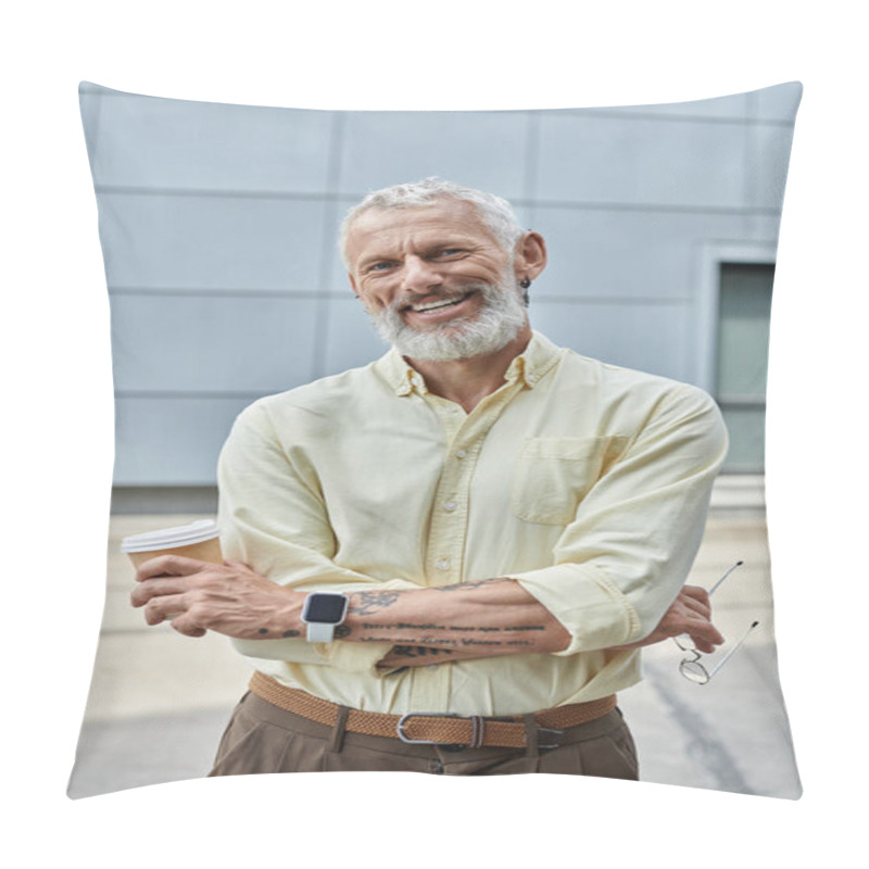 Personality  A Mature Man With A Beard And A Warm Smile Stands Outside, Holding A Coffee Cup. He Is Wearing A Light Yellow Shirt And Brown Pants. Pillow Covers