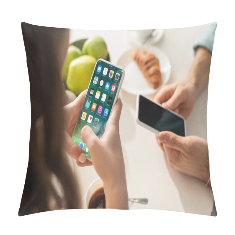 Personality  KYIV, UKRAINE - FEBRUARY 21, 2020: Selective Focus Of Woman Using Smartphone With Iphone Screen Near Boyfriend And Breakfast  Pillow Covers