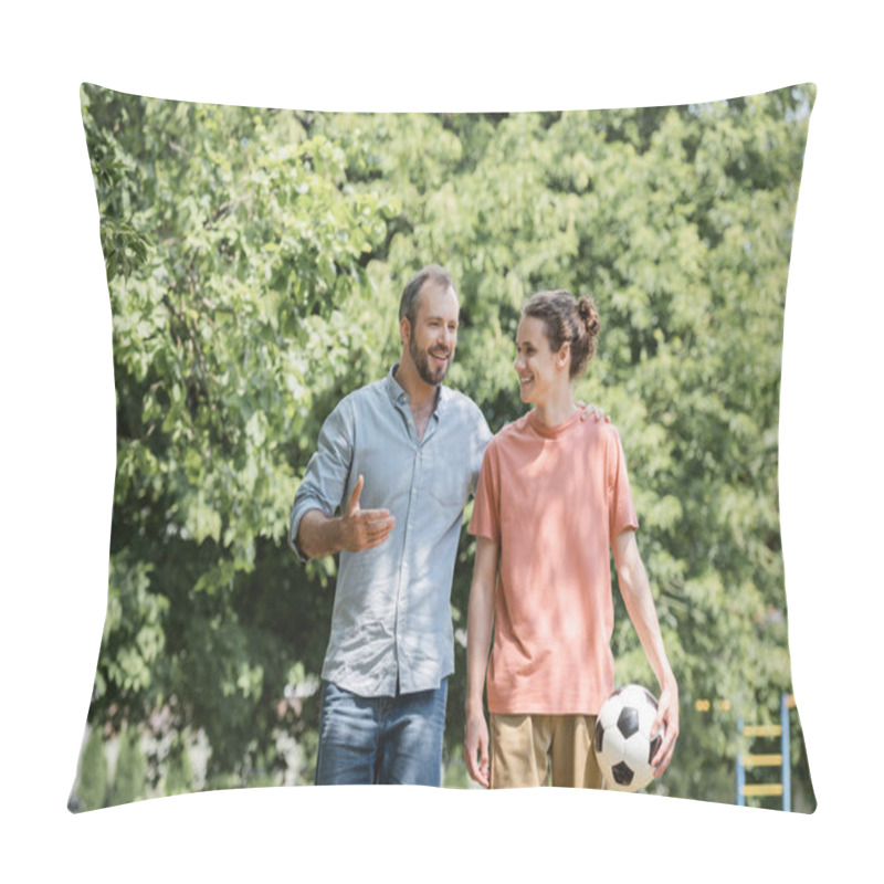 Personality  Happy Father Hugging Teenage Son Holding Football While Walking In Green Park  Pillow Covers