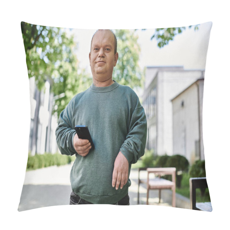 Personality  A Man With Inclusivity Holding A Phone Walks Along A City Street With Green Trees In The Background. Pillow Covers