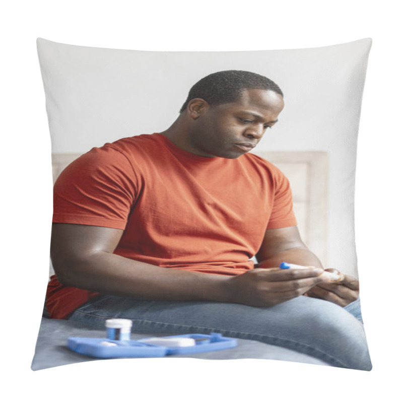 Personality  Portrait Of African American Man Sitting On Bed And Testing Blood Sugar With Glucometer. Home Health Prevention. Health Care, Medicine Concept Pillow Covers