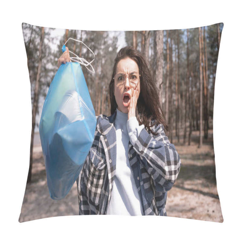 Personality  Shocked Young Woman Holding Blue Trash Bag In Forest  Pillow Covers