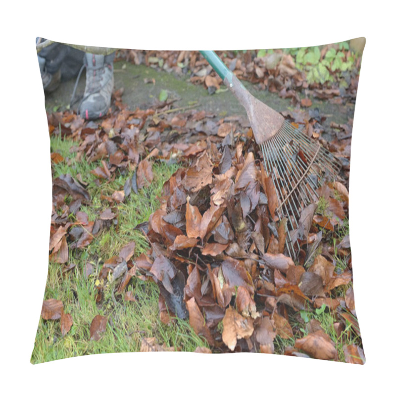 Personality  An Old Rusted Metal Rake Drags A Bundle Of Damp Autumn Leaves Over The Lawn. Gardeners Boots Visible In The Corner, Close Up View Of The Rake. Pillow Covers