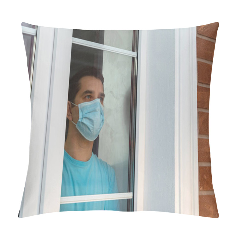 Personality  Young Man In Medical Mask Is Looking Out Window. Coronavirus Pandemic. Home Quarantine, Self-isolation Because Of The Coronavirus Disease, COVID-19. Man In Medical Mask Stay At Home. Self Isolation. Pillow Covers