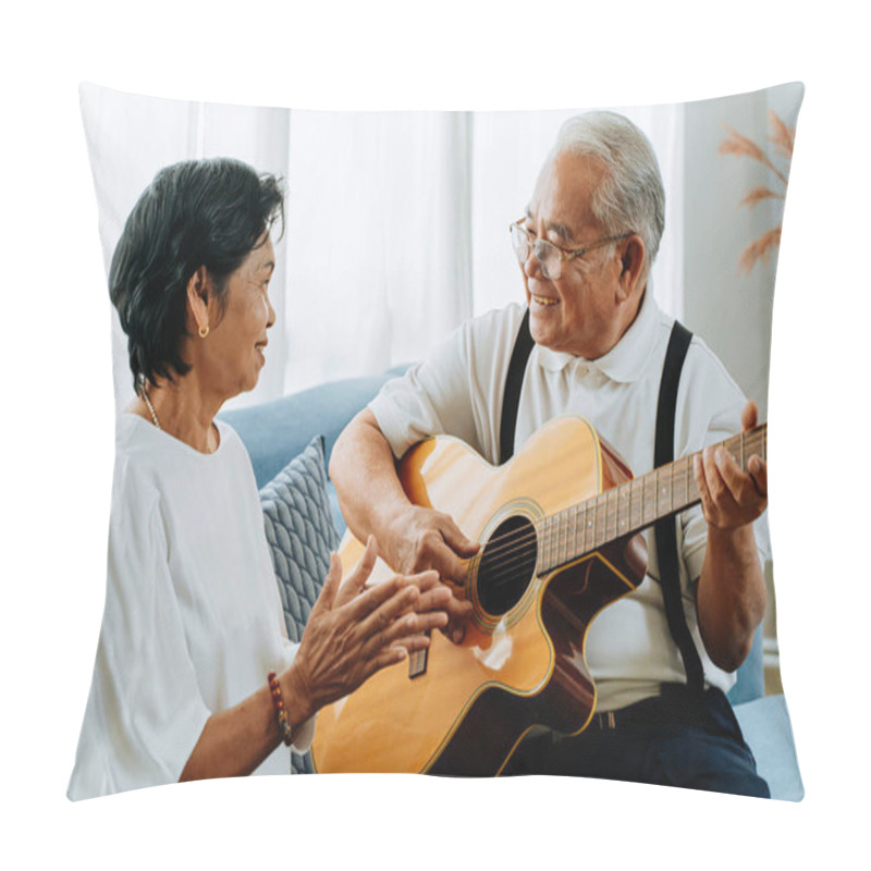 Personality  Asian Senior Couple Sitting On The Sofa And Playing Acoustic Guitar Together. Happy Smiling Elderly Woman Clapping Hands While Old 70s Guitarist Husband Singing. Enjoying Retirement Life At Home. Pillow Covers