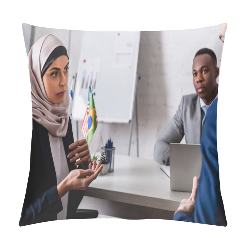 Personality  Arabian Businesswoman In Hijab Gesturing While Talking To Multicultural Partners During Meeting, Blurred Foreground Pillow Covers