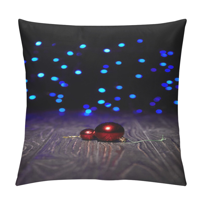 Personality  Red Christmas Balls On Wooden Table With Blue Sparkling Background Pillow Covers