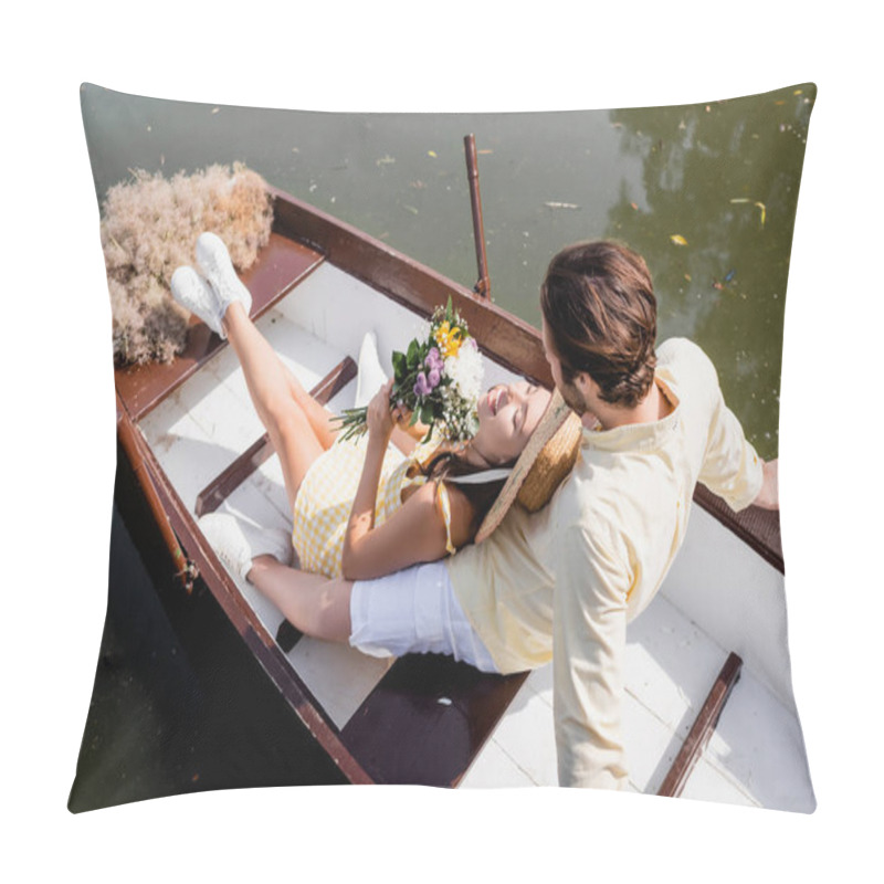 Personality  High Angle View Of Young Woman In Straw Hat Holding Bouquet Of Flowers And Lying In Boat With Man  Pillow Covers