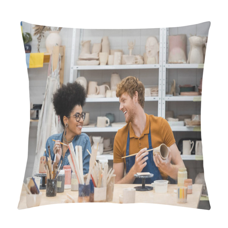 Personality  Smiling Man Looking At African American Girlfriend Near Clay And Paintbrushes In Pottery Studio  Pillow Covers