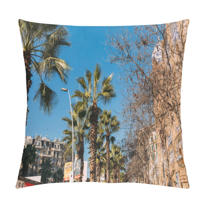 Personality  BARCELONA, SPAIN - DECEMBER 28, 2018: Urban Scene With Buildings And Tall Green Palm Trees Pillow Covers