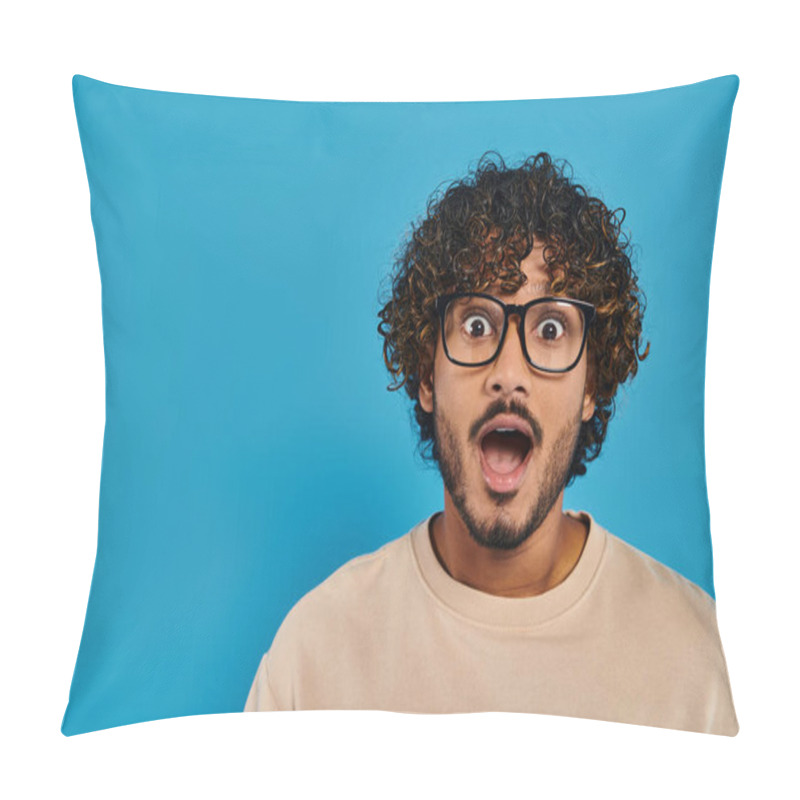 Personality  An Indian Student With Curly Hair And Glasses Looks Surprised On A Blue Backdrop. Pillow Covers