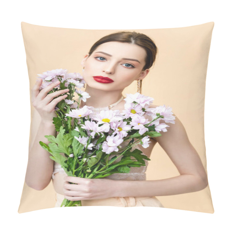 Personality  Attractive Young Woman Holding Blooming Flowers And Looking At Camera Isolated On Beige  Pillow Covers