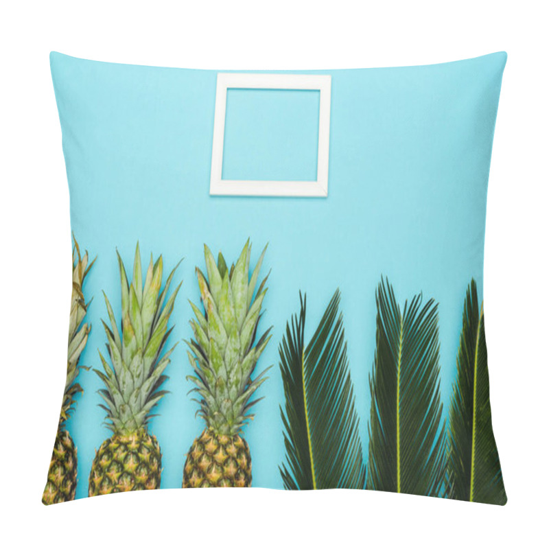 Personality  Top View Of Green Palm Leaves And Ripe Pineapples Near Square Empty Frame On Blue Background Pillow Covers