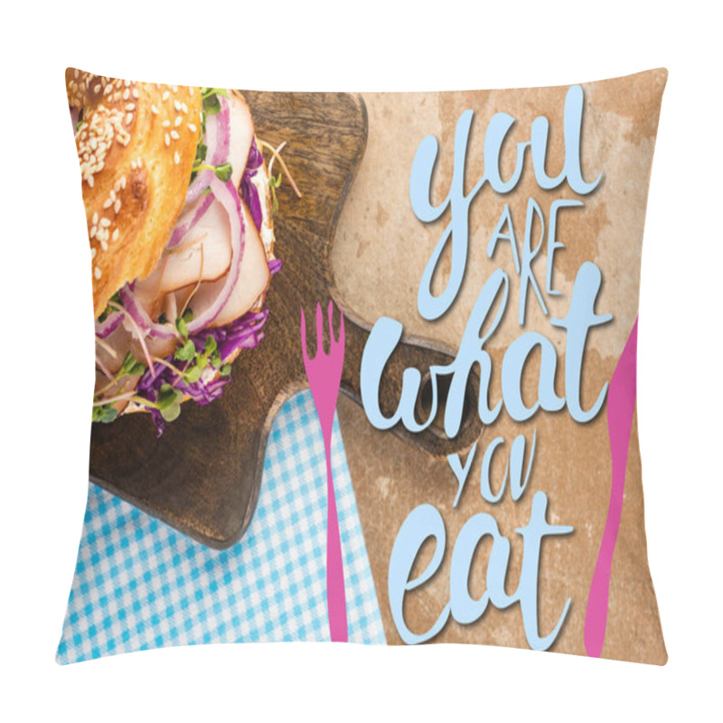 Personality  Top View Of Fresh Bagel With Meat On Cutting Board And Plaid Napkin Near You Are What You Eat Lettering And Cutlery Illustration  Pillow Covers