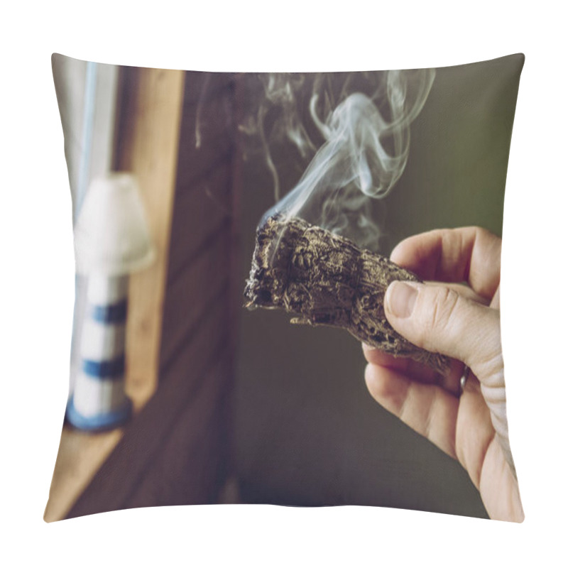 Personality  Woman Hand Holding Herb Bundle Of Dried Sage Smudge Stick Smoking. It Is Believed To Cleanse Negative Energy And Purify Living Spaces At Home In Rooms. Pillow Covers